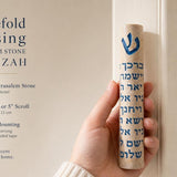 Person holding the Jerusalem stone mezuzah with Priestly Blessing in blue Hebrew lettering, natural soft light, editorial style.