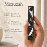 Person holding the precise mezuzah at realistic scale with balanced editorial text, demonstrating size and detail in a 9:16 layout.