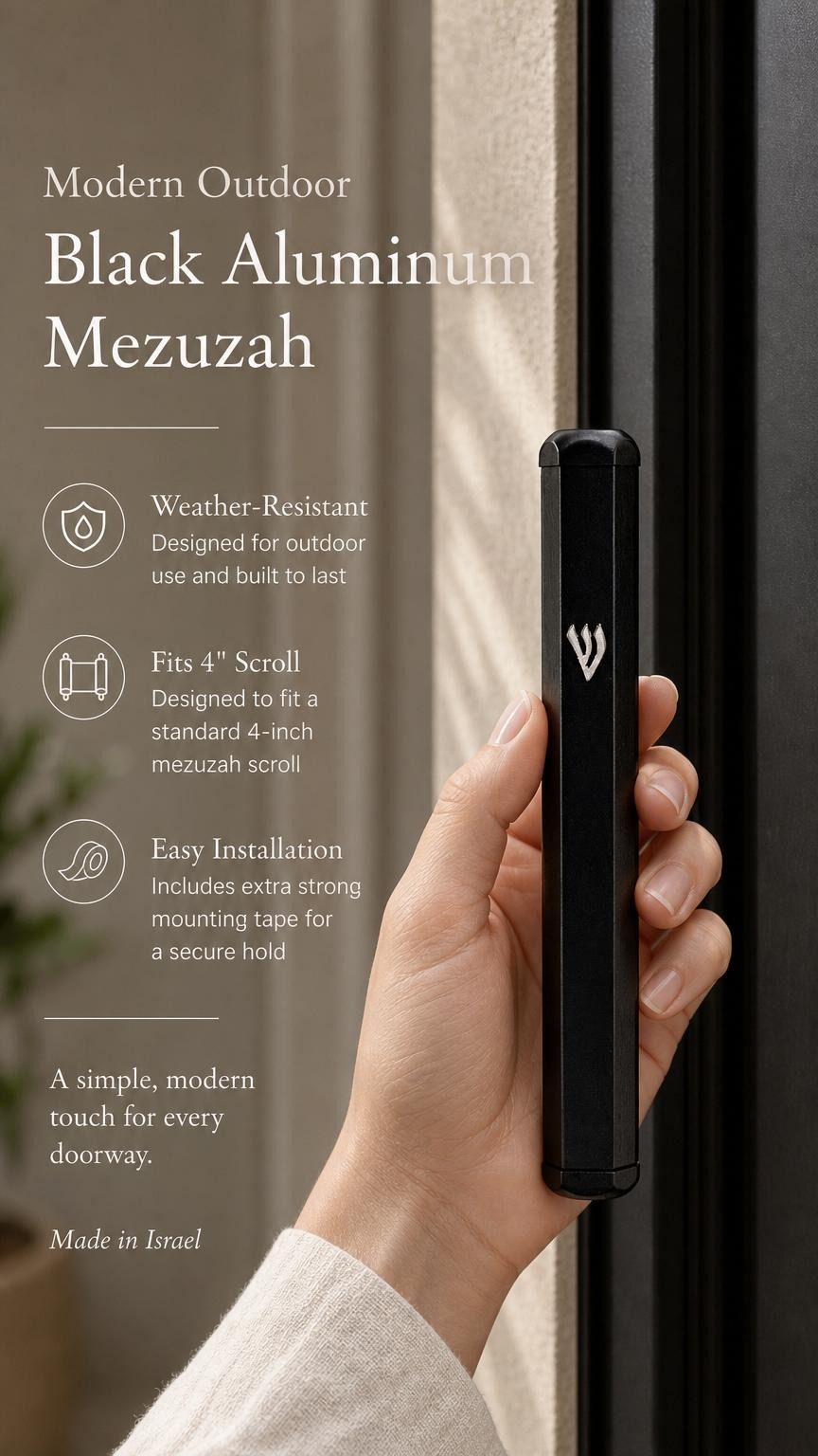 Person holding a sleek black aluminum mezuzah with Shin detail, showcasing its design and scale for e-commerce presentation.