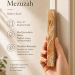 Person holding the exact Jerusalem stone mezuzah at realistic scale, demonstrating size and material for a premium Mezuzah Store display.