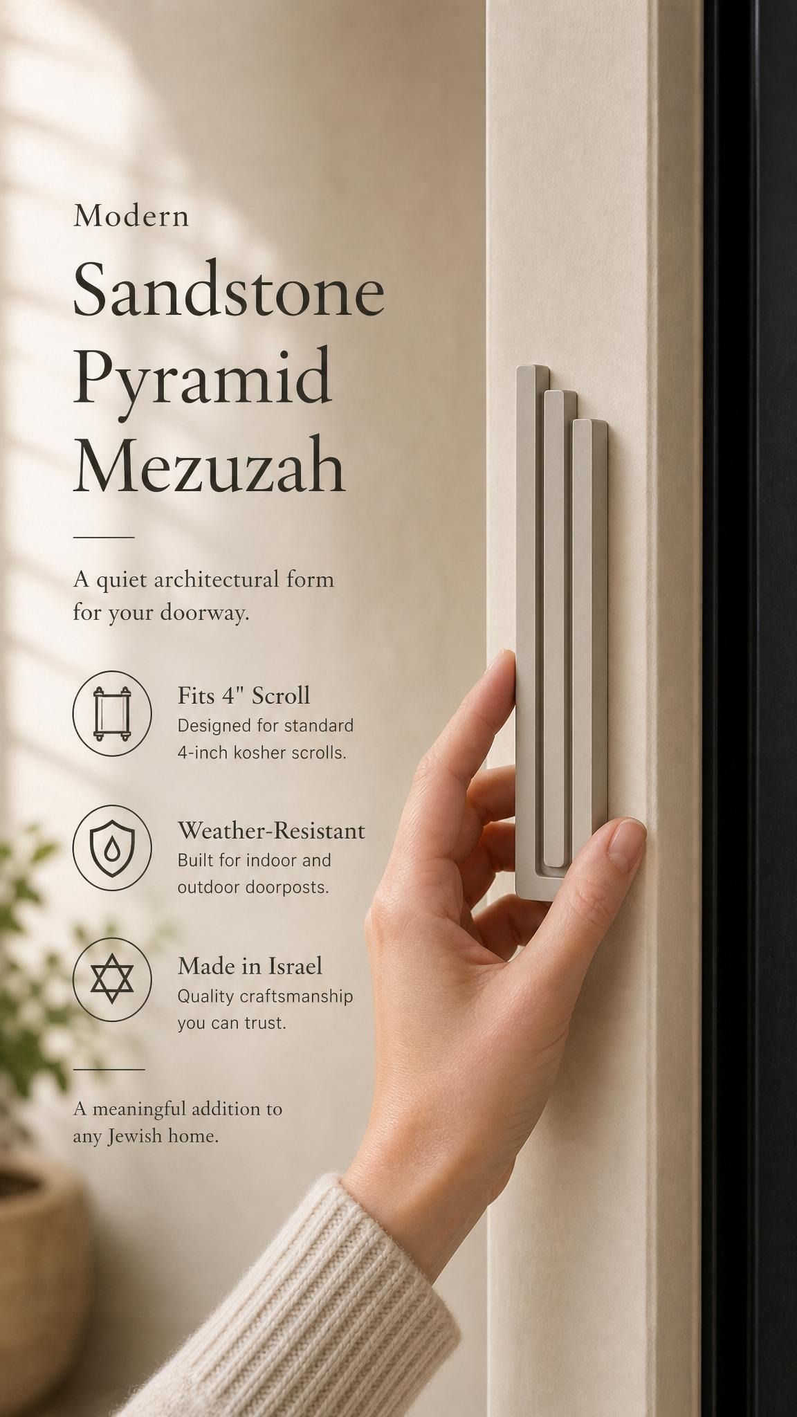 Person naturally holding the exact modern sandstone pyramid mezuzah cover showcasing its design and material.