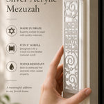 Person naturally holding the Blessings of Peace Silver Acrylic Mezuzah with warm lighting and elegant composition, emphasizing product details.