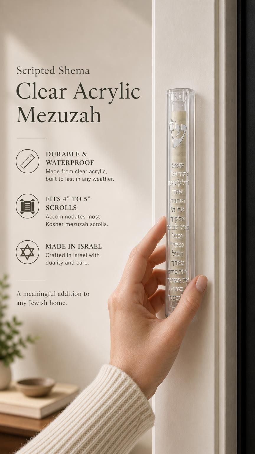 Hand holding the 5.5-inch clear acrylic mezuzah with silver Shema lettering.