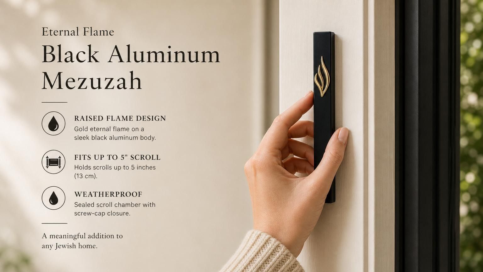 Person holding the exact black aluminum mezuzah with gold flame emblem, displaying its design and dimensions for ceremonial use.