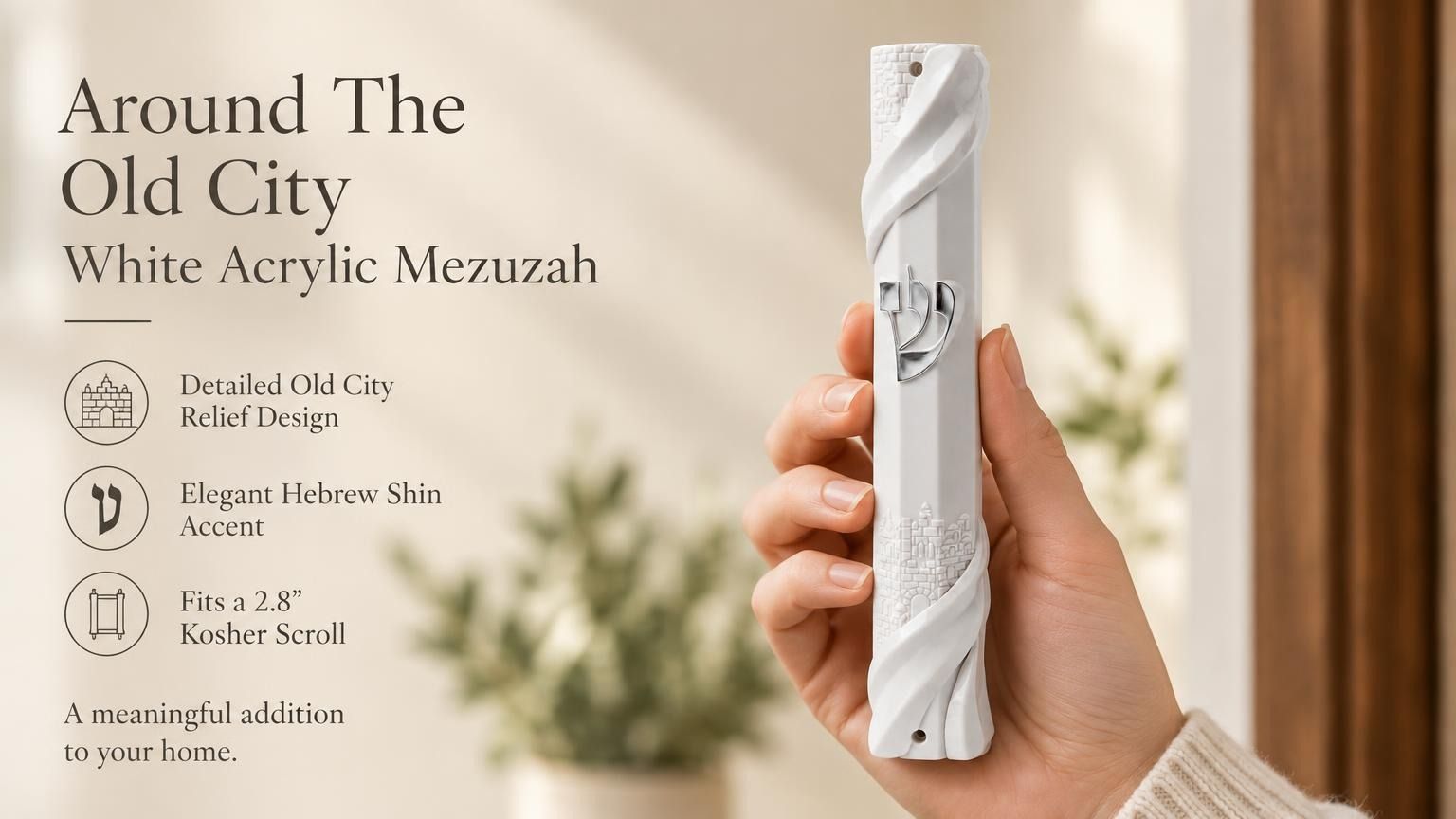 Hand-held white acrylic mezuzah case featuring curved edges and detailed Jerusalem masonry relief.