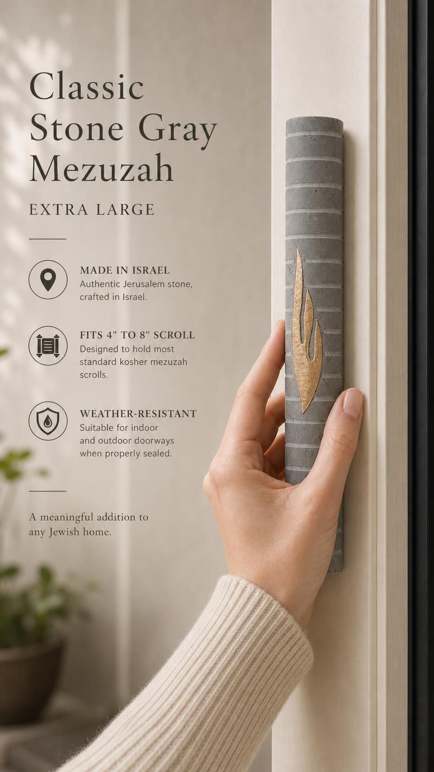 Hand holding the Yerushalayim gray and gold Jerusalem stone mezuzah showing its finish.