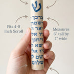 Hand holding the threefold Blessing Jerusalem stone mezuzah case with blue Shin and full Hebrew Birkat Kohanim inscription in a minimalist style, emphasizing material, size, and mounting details for religious decor.