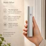 Person naturally holding the aluminum matte silver mezuzah, showcasing its true size and details for online store presentation.