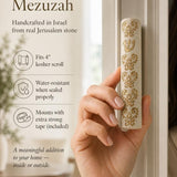 Hand held Baroque style Jerusalem stone mezuzah with decorative gold detailing for a premium home entrance.