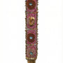 Pink handmade Mezuzah decorated with sequins and stones, crafted by Israeli artist Eva Mishaan, shown on a white studio background with soft reflection.