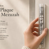Person holding the exact Clear Jerusalem Silver Plaque Lucite Mezuzah, showcasing its transparent acrylic case and detailed silver Jerusalem plaque in a lifestyle setting.