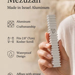 Modern Silver Steps mezuzah specification image highlighting the 4-inch Israeli aluminum body, 2.8-inch kosher scroll fit, waterproof use, and bottom opening