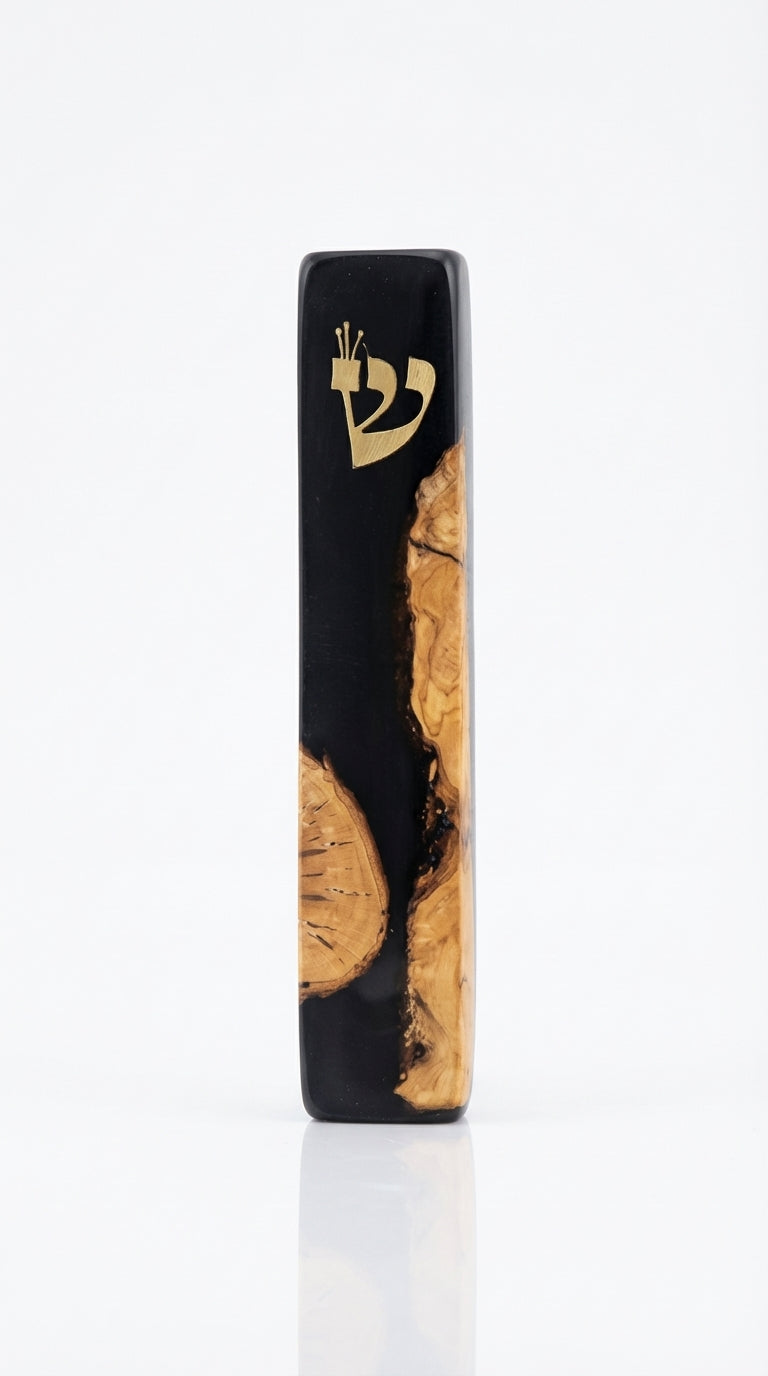 Healing black Mezuzah made of olive wood and resin, with intricate Hebrew engravings, mounted on a white studio background with soft reflection.