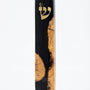 Healing black Mezuzah made of olive wood and resin, with intricate Hebrew engravings, mounted on a white studio background with soft reflection.
