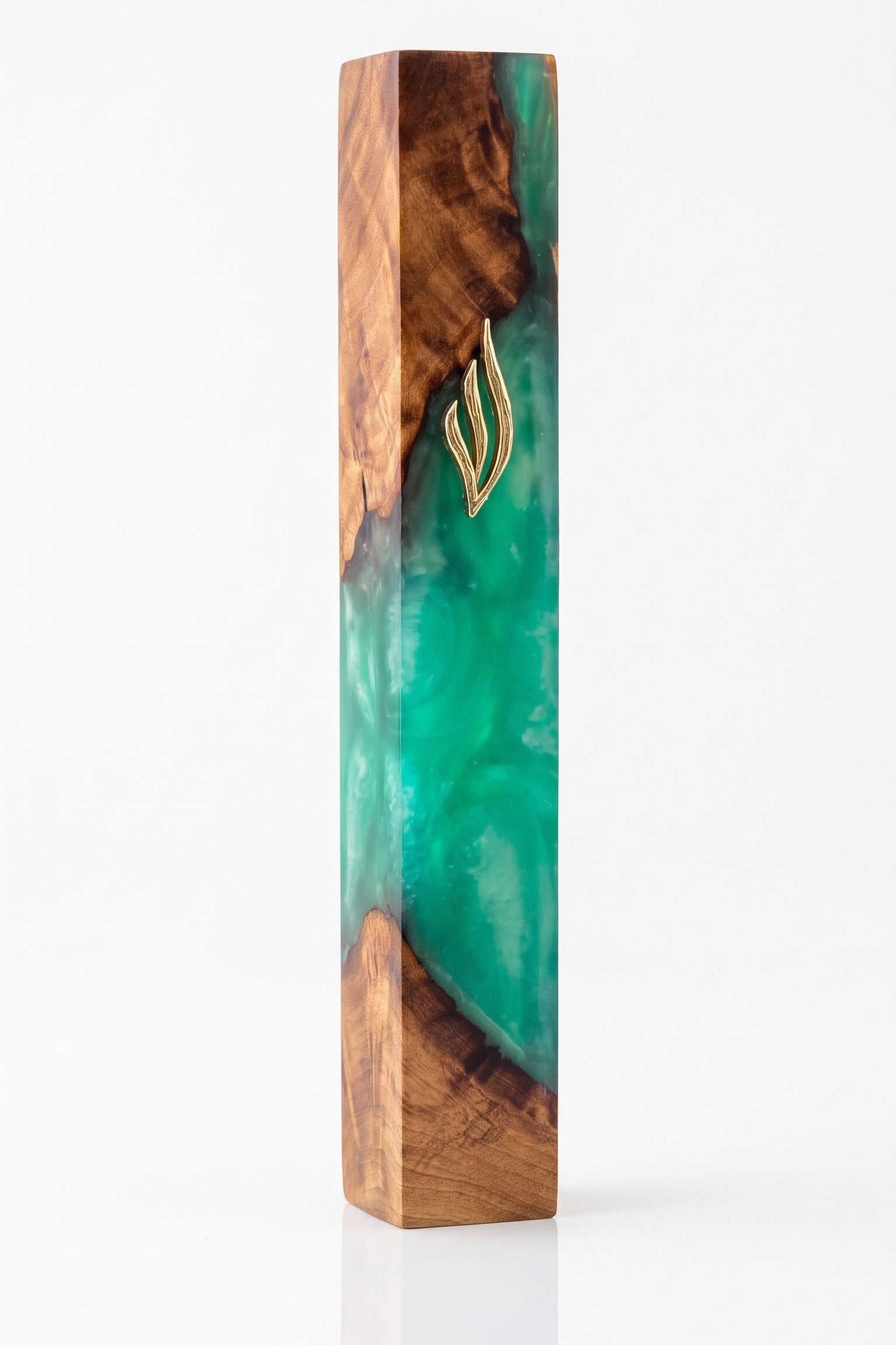 Artistic Olive Wood Emerald Green Resin Mezuzah standing on a white studio background, a handmade Israeli mezuzah case pairing warm olive wood grain with translucent emerald green resin and a gold Shin, made for a 6-inch kosher scroll