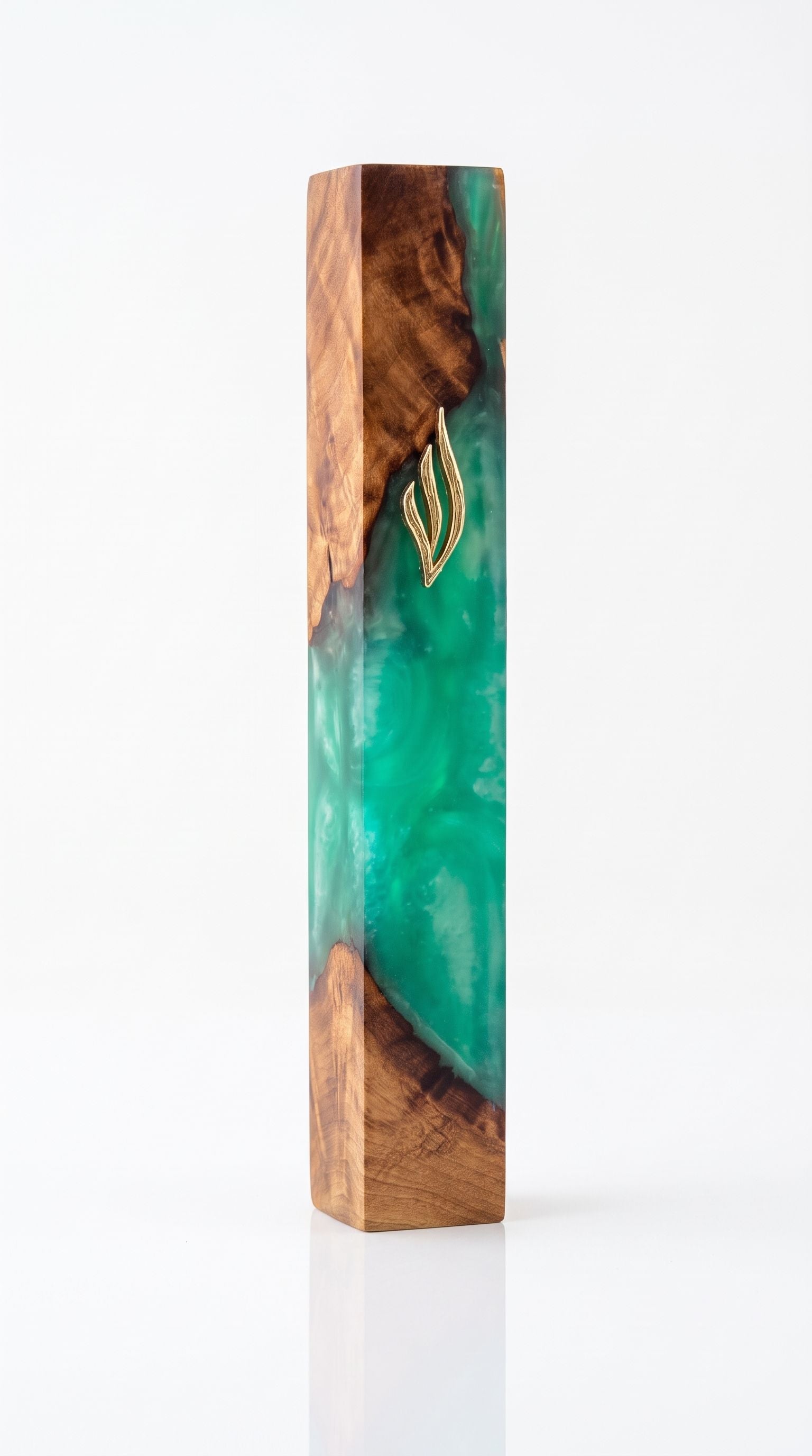 Artistic Olive Wood Emerald Green Resin Mezuzah standing on a white studio background, a handmade Israeli mezuzah case pairing warm olive wood grain with translucent emerald green resin and a gold Shin, made for a 6-inch kosher scroll