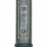 Upscale Torah Mezuzah made of pewter and enamel, 6 inches long, detailed Hebrew engravings and decorative motifs, on a pure white background with soft reflection.