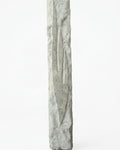 Detailed mezuzah with engraved Hebrew letters and decorative motifs on a pure white background, with a soft reflection below.
