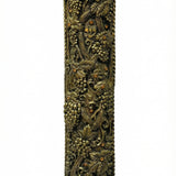 Large brass mezuzah with intricate details and Hebrew engravings, designed for front door installation, on a white background with soft reflection.
