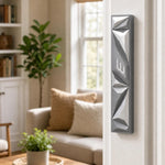 Cyber Prism Silver Geometric Mezuzah mounted on a residential doorpost in a natural indoor setting, positioned on the right side of the door.