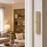 Real Jerusalem stone Golden Arch Mezuzah mounted on a residential doorpost in a natural indoor setting.