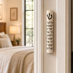 Realistic indoor scene of Jerusalem Stone Mezuzah mounted vertically on a residential doorpost, positioned in the lower third area.
