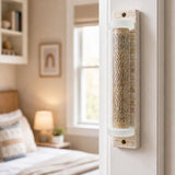 Hyper-realistic indoor scene of a Jerusalem Stone Mezuzah mounted on a doorpost at true-to-life scale, showing detailed engraving and frosted glass cap.