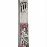 Pewter Jerusalem Mezuzah with pink stones, made in Israel, featuring intricate Hebrew engravings and decorative motifs, mounted on a white background.