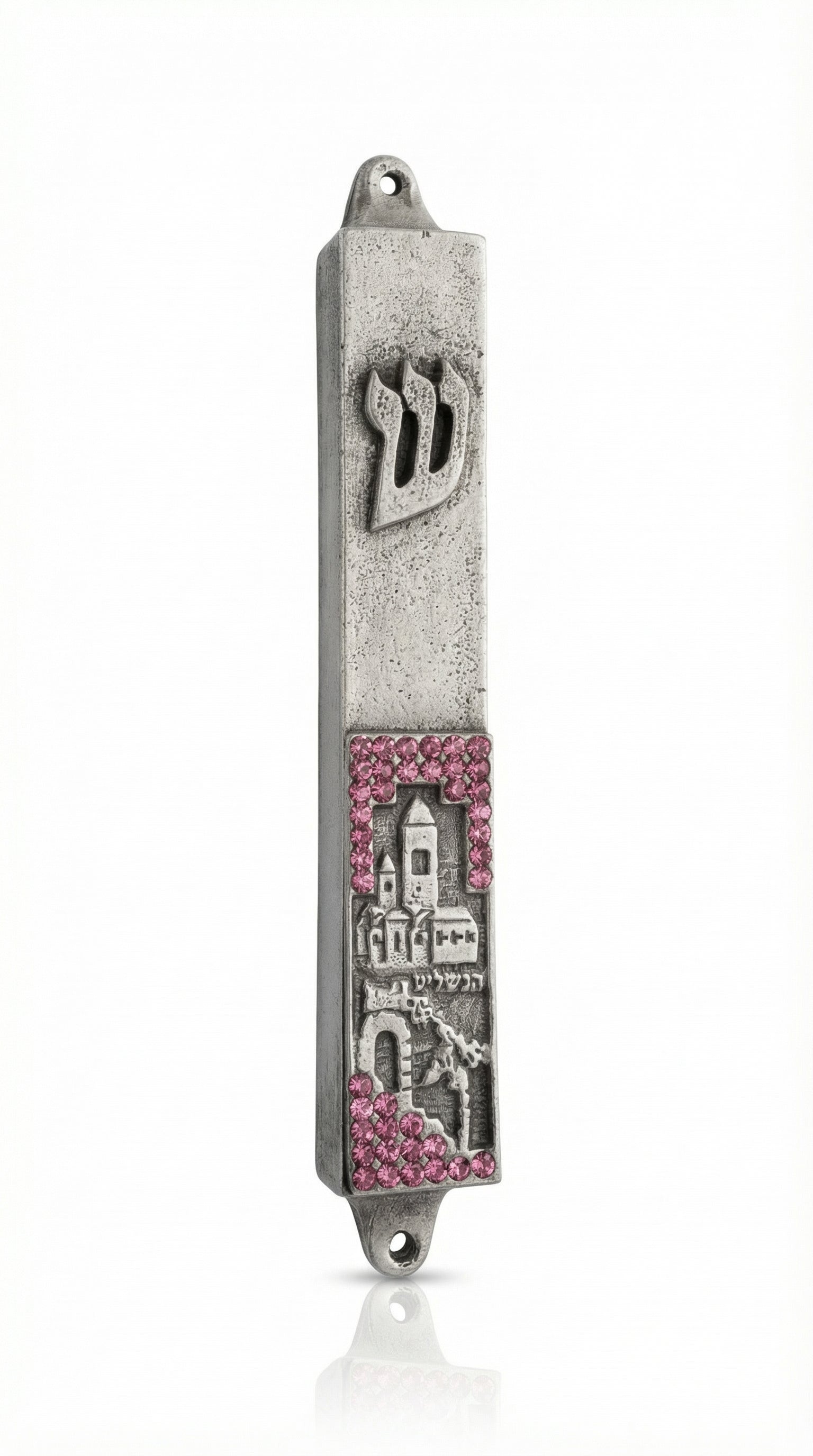 Pewter Jerusalem Mezuzah with pink stones, made in Israel, featuring intricate Hebrew engravings and decorative motifs, mounted on a white background.