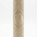 High-resolution image of handcrafted Jerusalem Stone mezuzah with detailed surface texture, engraved Hebrew letters, and a clean white studio background.