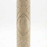 High-resolution image of handcrafted Jerusalem Stone mezuzah with detailed surface texture, engraved Hebrew letters, and a clean white studio background.
