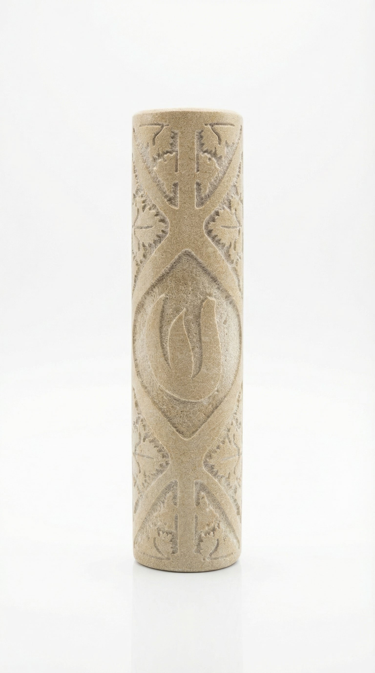 High-resolution image of handcrafted Jerusalem Stone mezuzah with detailed surface texture, engraved Hebrew letters, and a clean white studio background.