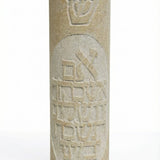 High-resolution image of a handcrafted Jerusalem stone mezuzah with Hebrew inscription, on a pure white background with soft reflection, showcasing intricate details and natural stone texture.