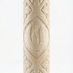 Carved Leaf Jerusalem Stone Mezuzah in cream natural stone with raised leaf motif, geometric carving and rounded handmade texture