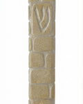 High-resolution image of a handcrafted Jerusalem stone Mezuzah with Western Wall design, natural surface variations, and intricate details, on a white background with soft reflection.