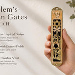 Peach enamel Jerusalem mezuzah with gold accents, Hebrew Shin, Star of David, Jerusalem architecture, in a holder.