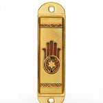 Journey Hamsa Gold Car Mezuzah shown from the front as a mezuzah cover featuring a brown Hamsa hand with a Star of David in its palm, warm gold-colored panels and patterned borders inside a rounded stainless-steel frame, presenting a small decorative Judaica design for a car interior