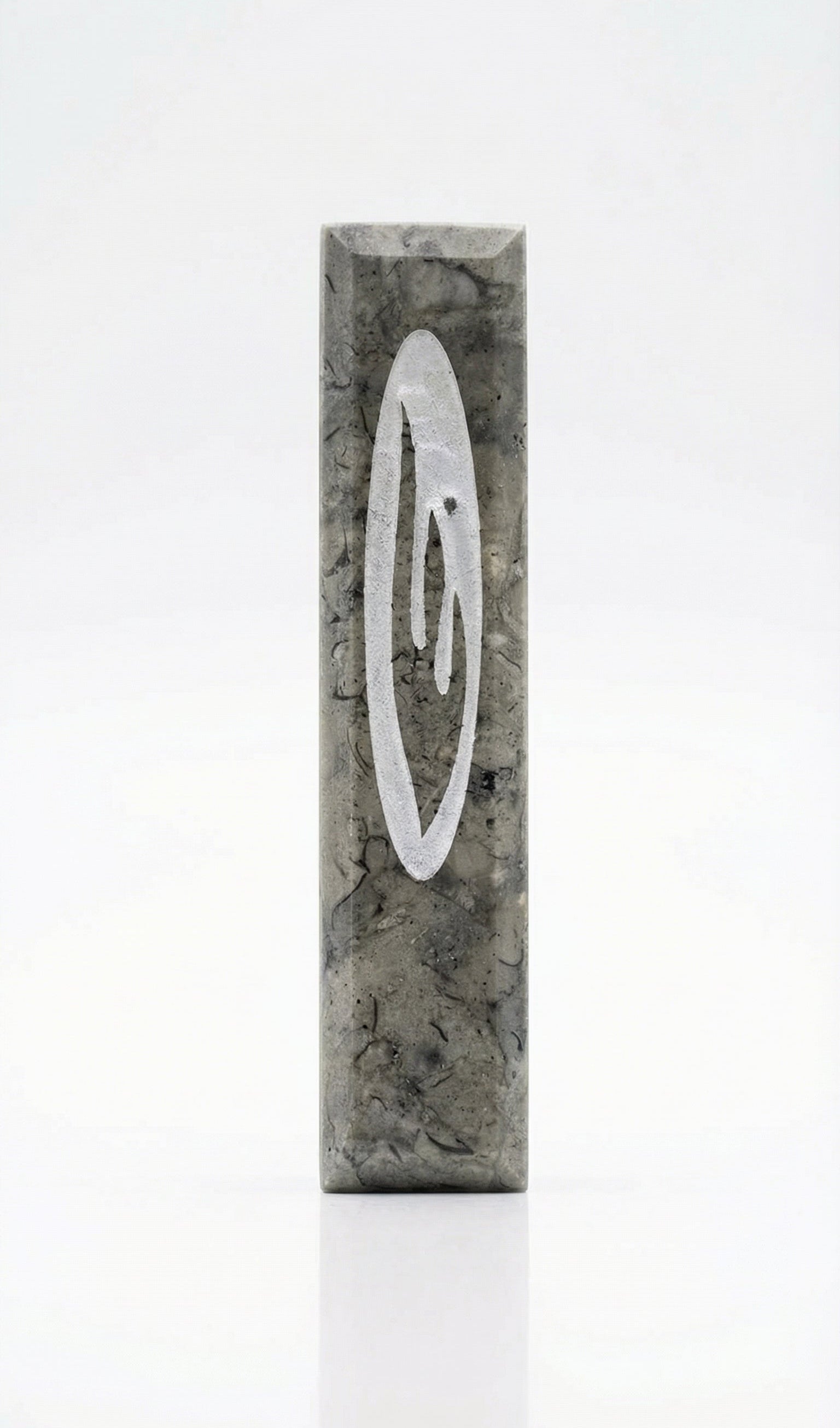 Judah Stone Mezuzah made from Jerusalem stone, handcrafted in Israel, with detailed engravings and textured surface characteristics.