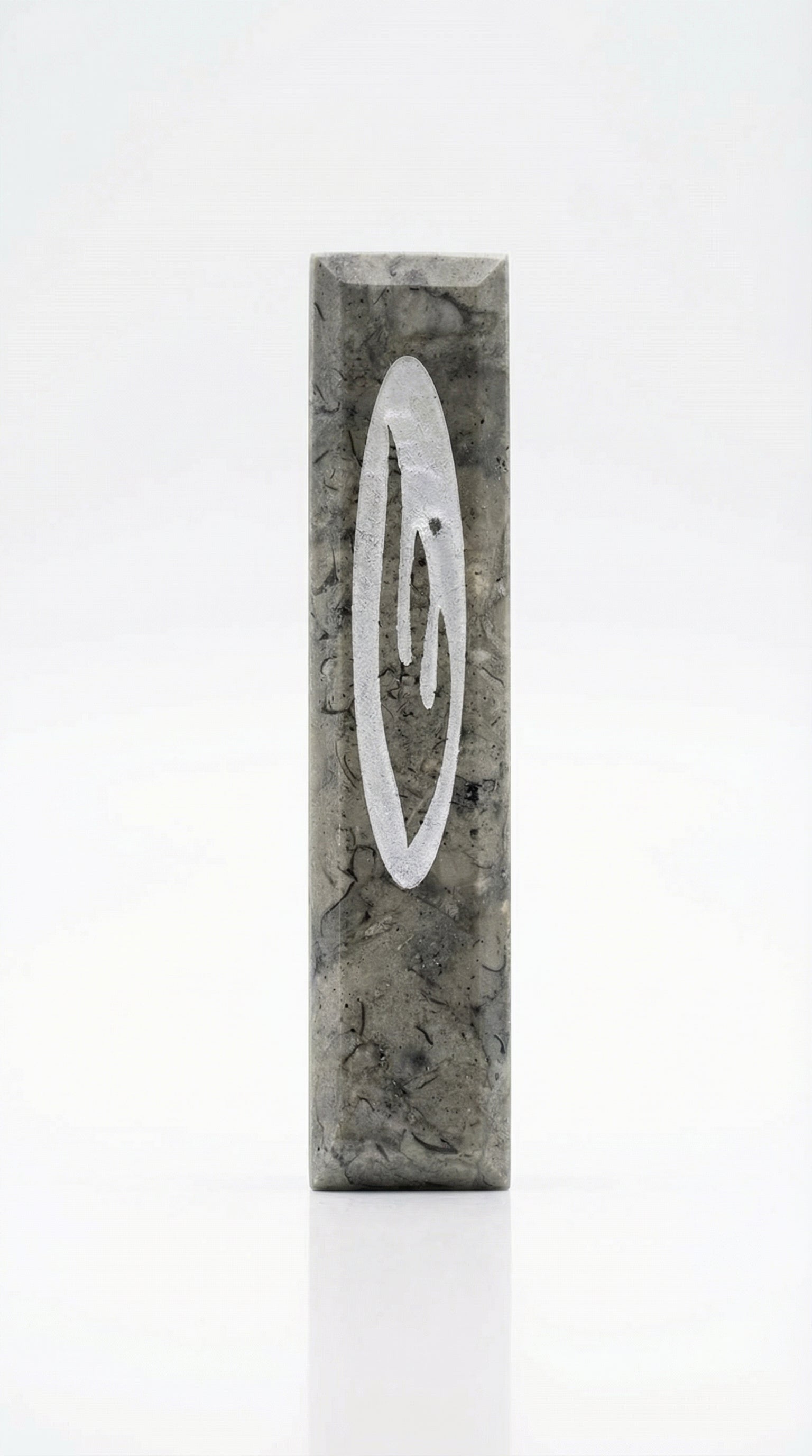 Judah Stone Mezuzah made from Jerusalem stone, handcrafted in Israel, with detailed engravings and textured surface characteristics.