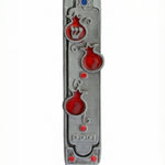 Lush pomegranate pewter mezuzah with Hebrew inscriptions by Israeli artist Emanuel, measuring 5.5 inches, designed for home doorways with a bright white studio background.