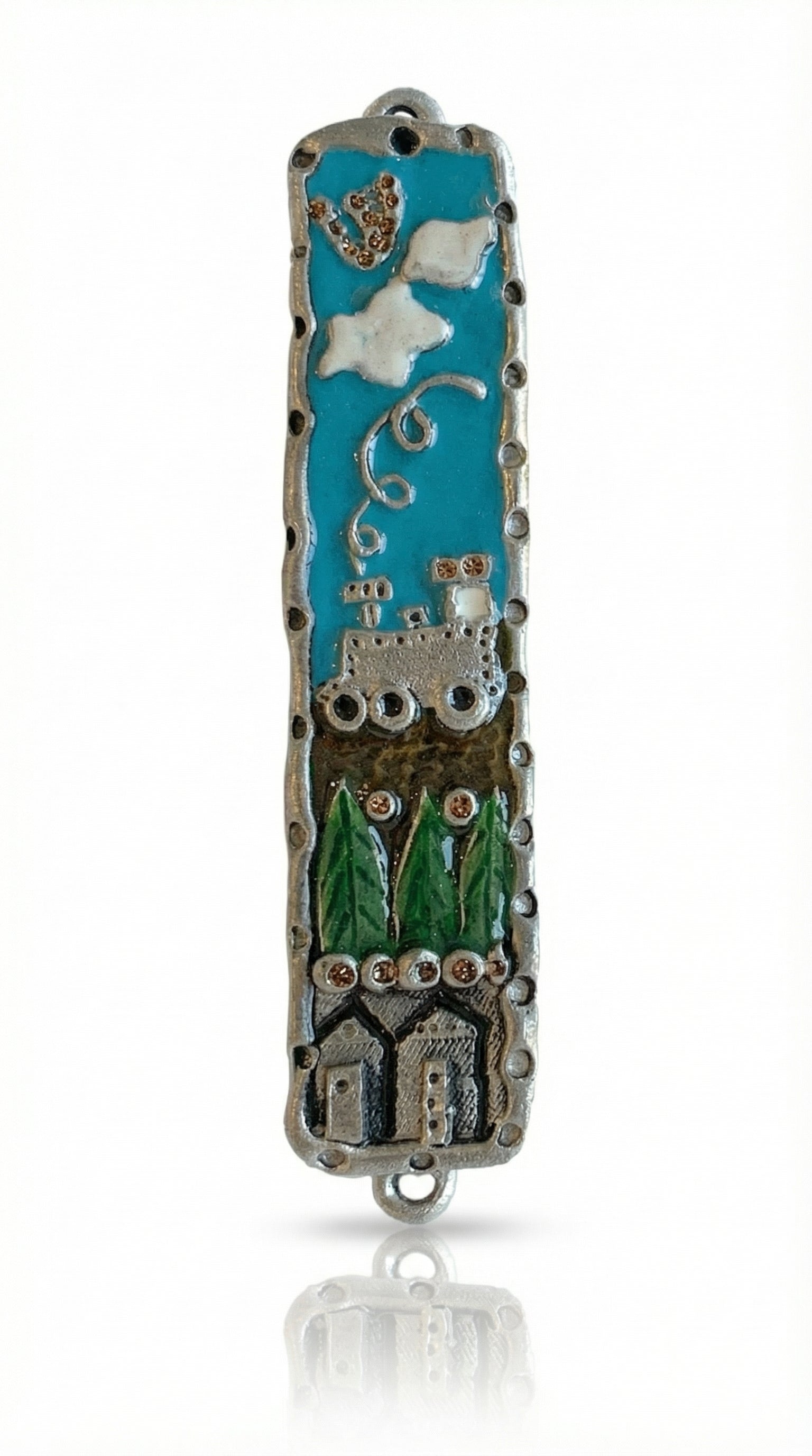 Kids room Mezuzah made of pewter and enamel, 4 inches long, with Hebrew letters, decorative motifs, and attached with nails or screws.