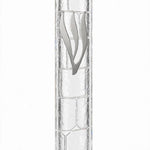 Kotel Stonework Clear Silver Shin Mezuzah shown from the front as a mezuzah cover featuring a clear plastic body, molded stone-block texture and an elongated silver-colored Hebrew Shin above the rounded bottom closure, presenting a detailed Judaica design for a Jewish home doorway