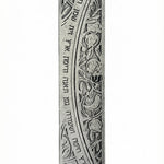 Detailed pewter mezuzah with Hebrew Torah verse, featuring engraved motifs and symbols, displayed on a white background with soft reflection.