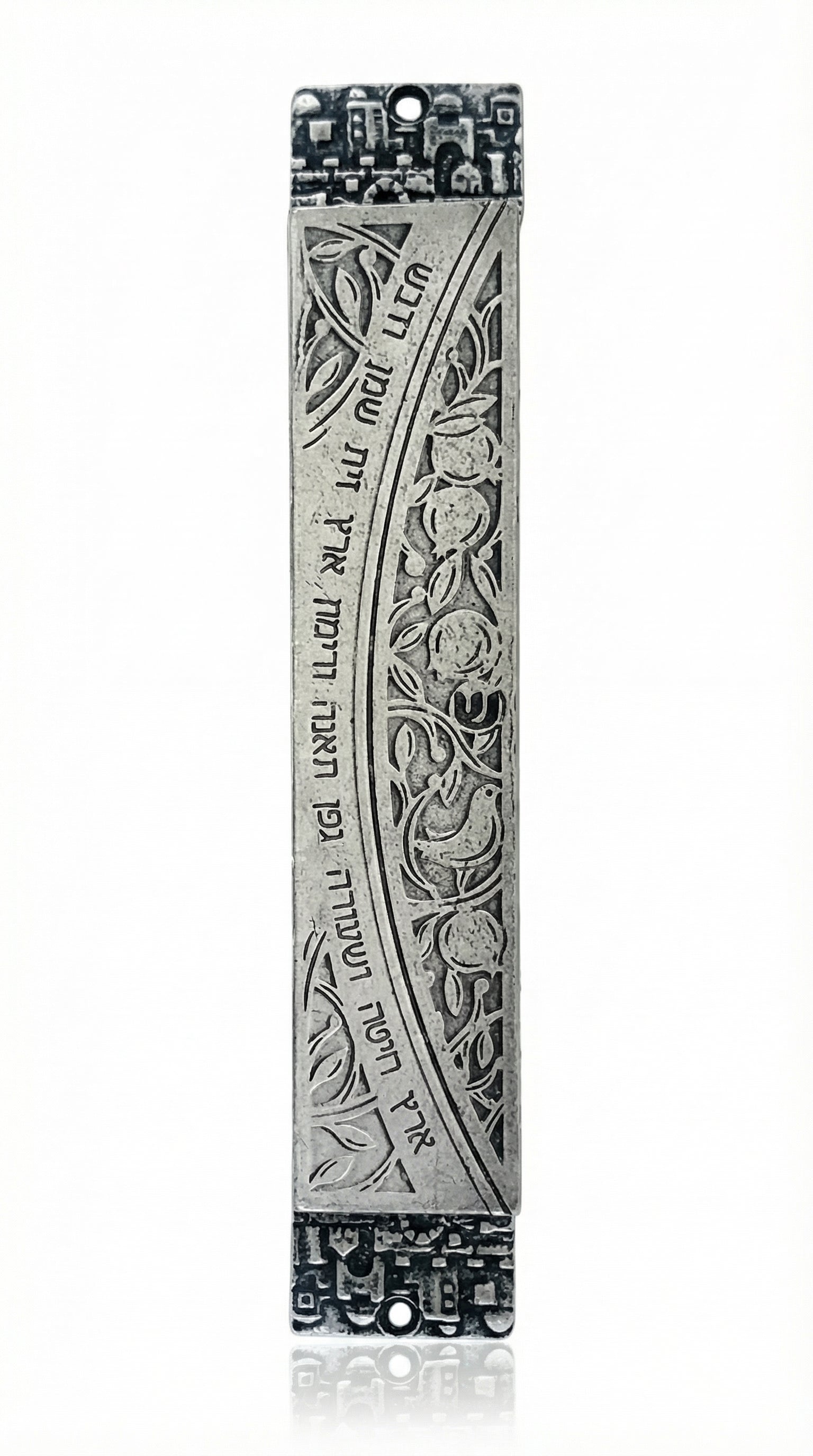 Detailed pewter mezuzah with Hebrew Torah verse, featuring engraved motifs and symbols, displayed on a white background with soft reflection.