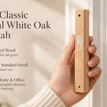 Large Classic Natural White Oak Wooden Mezuzah case held beside an entrance with pale honey colored grain and a white outline Shin, accompanied by product text highlighting natural oak and Jewish home and office doorways