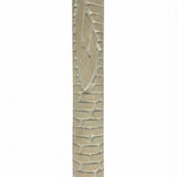 Extra large Jerusalem stone Mezuzah mounted with strong tape in a bright studio setting, detailed surface texture and engraved Hebrew lettering visible.
