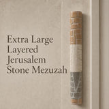 Extra large layered Jerusalem stone mezuzah displayed on a plain background, emphasizing its sculptural design and natural earth tones.