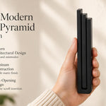 Large Modern Black Pyramid Mezuzah pictured in hand as a deep matte black aluminum mezuzah cover with three graduated bars and a contemporary stepped design, alongside its name and illustrated product features in a wide social-sharing image
