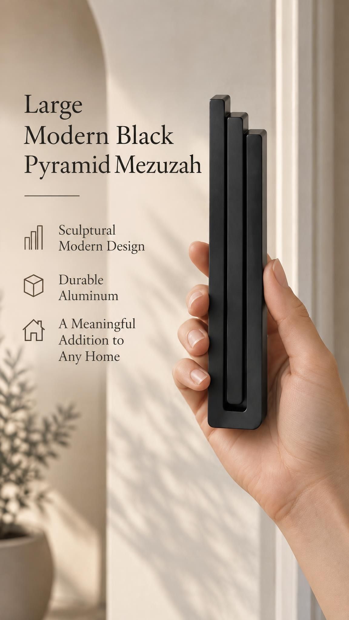 A hand presents the Large Modern Black Pyramid Mezuzah with its deep matte black aluminum mezuzah cover facing forward, highlighting the clean graduated bars and geometric vertical profile beside design illustrations for a contemporary Jewish doorway accent