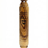 Natural olive wood Mezuzah with Hebrew inscriptions, mounted on a white background with subtle reflection, detailed wood grain visible.